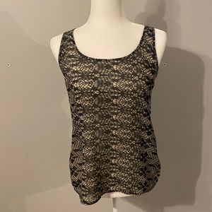 Tank top, super cute opening in the back.